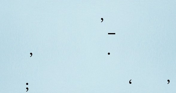 Picture of Australian Poetry Anthology light blue cover, decorated with punctuation marks.